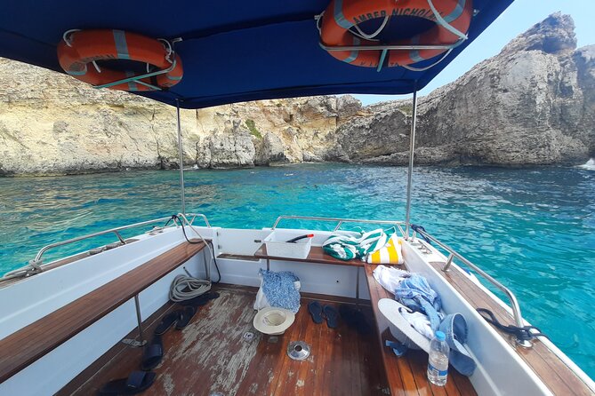 Boat Charters Blue lagoon, Crystal Lagoon, Comino, Malta 4hr trip - Elephant Head Rock and Santa Maria Bay: sand, shade, and a slower pace
