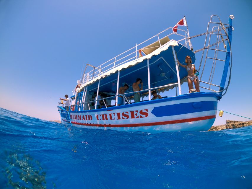Bugibba: Scenic Sunset Cruise with Blue Lagoon Swim Stop - Cruising North of Malta With Chill Reggae on Deck