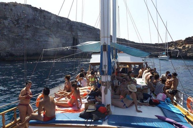 Comino, Blue Lagoon and Caves. Tour A - Boat comfort: sun deck, shade, ladders, and the practical stuff that matters