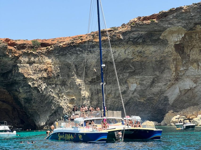 Comino: Blue Lagoon Catamaran Cruise with Lunch and Open Bar - Swim and snorkel stops: the day is built around the water
