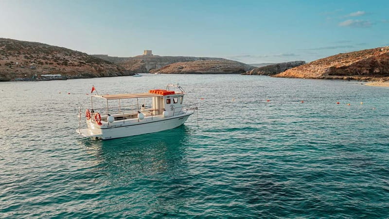 Comino: Blue Lagoon, Crystal Lagoon and Sea Caves Boat Tour - Small-boat Comino: why 24 people changes the day