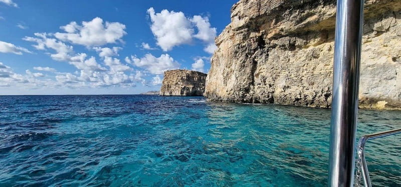 Comino: Blue Lagoon, Crystal Lagoon and Sea Caves Boat Tour - Scenic passes: Promising Rock, Halfa Rock, and San Niklaw Bay
