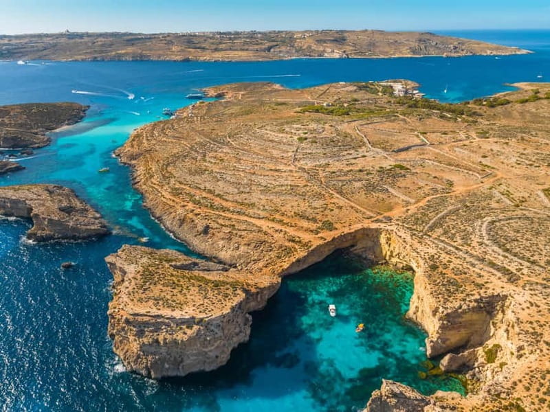 Comino: Blue Lagoon, Crystal Lagoon and Sea Caves Boat Tour - From Cirkewwa to Comino Tower: the opening cruise moment