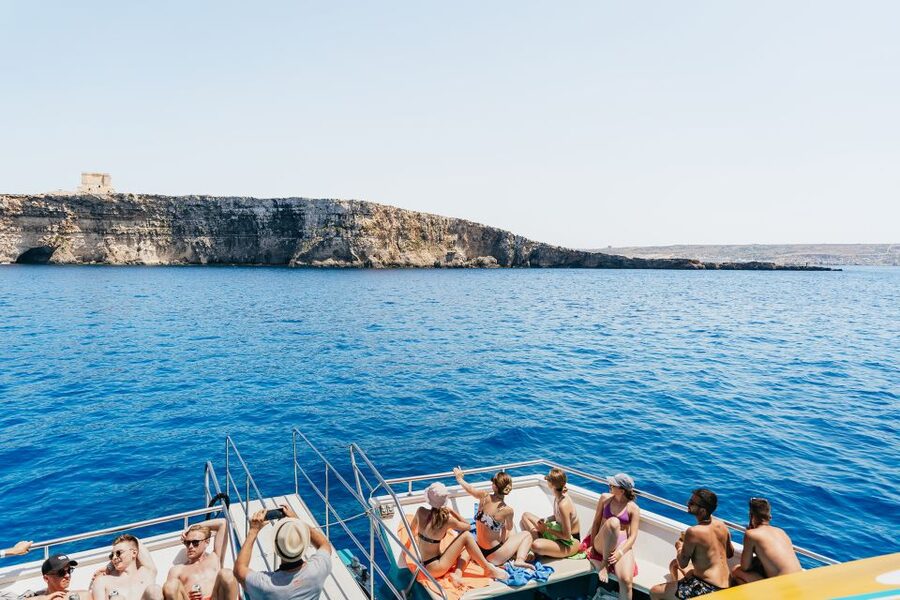 Comino: Blue Lagoon, Crystal Lagoon, and Seacaves Tour - Onboard Fun That Changes the Mood: Waterslide, Underwater Windows, and Deck Time
