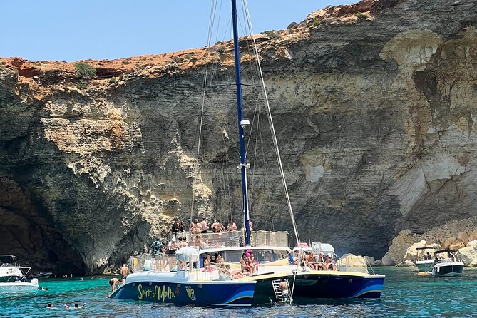 Comino Blue Lagoon Prime Catamaran Tour with All Inclusive - Open Bar Details: Wine, Beer, Soft Drinks, and Water (Age Limits Apply)