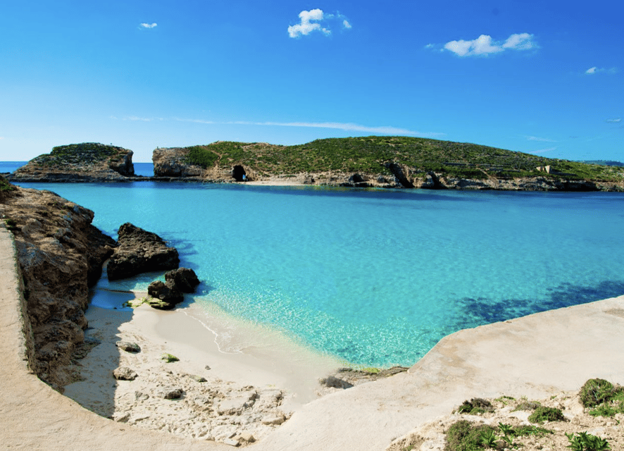 Comino: Mystic Caves, Blue and Crystal Lagoon Boat Cruise - Comino caves and rocky landmarks: Roofless Cave, Lovers Cave, and Pigeon Rock