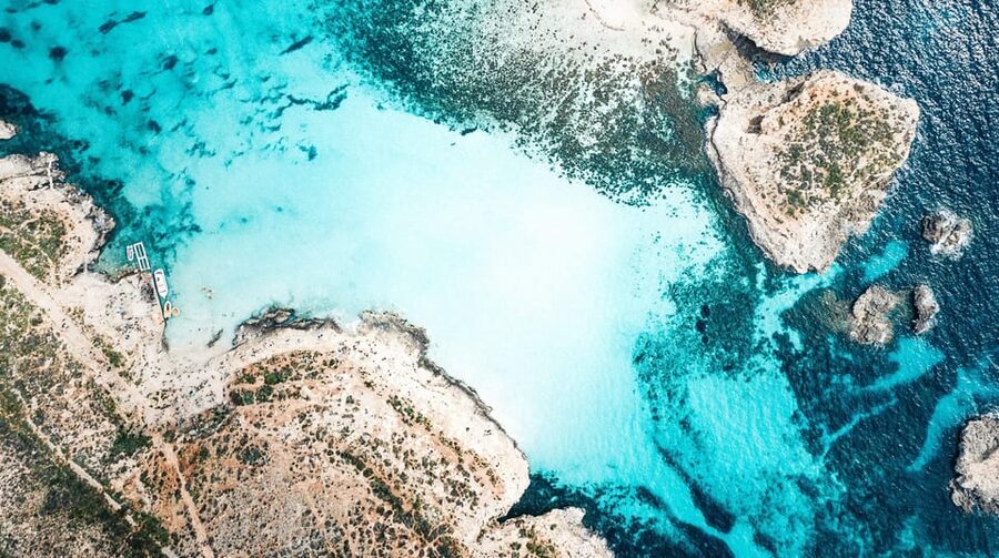 From Mellieha: Three Bay Cruise including the Blue Lagoon - Blue Lagoon Comino: turquoise swimming, beach crowds, and the access pass rule