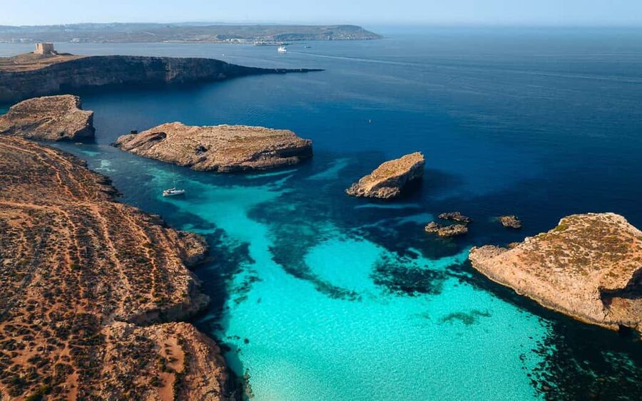 From Sliema: Comino & Blue Lagoon Trip - Including Boat Ride - Comino hike and photo stop: short trail, but mind your pace