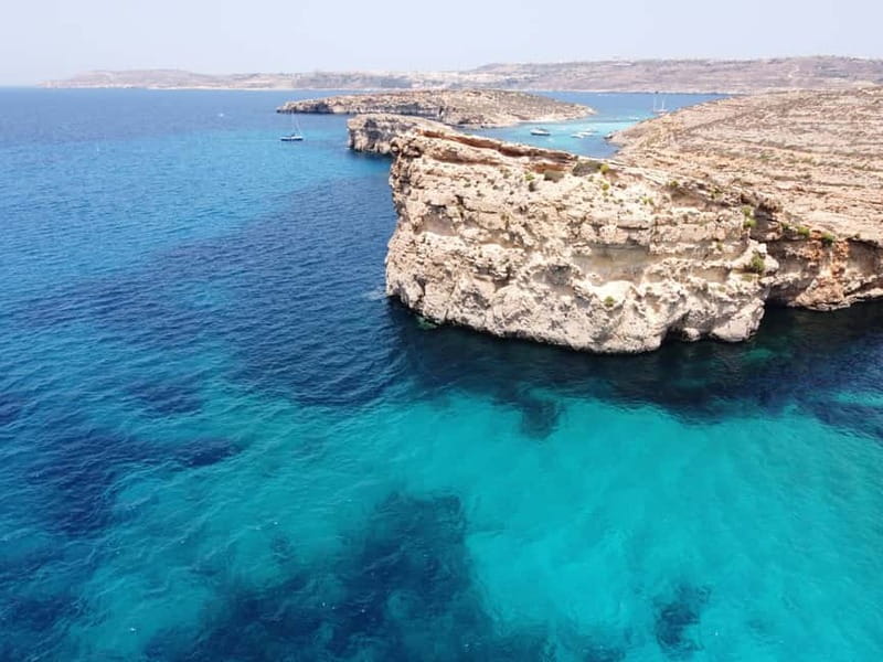 From Sliema: Comino, Crystal Lagoon, and Blue Lagoon Cruise - Mgarr Harbour on Gozo: a quick photo stop, plus optional Gozo time