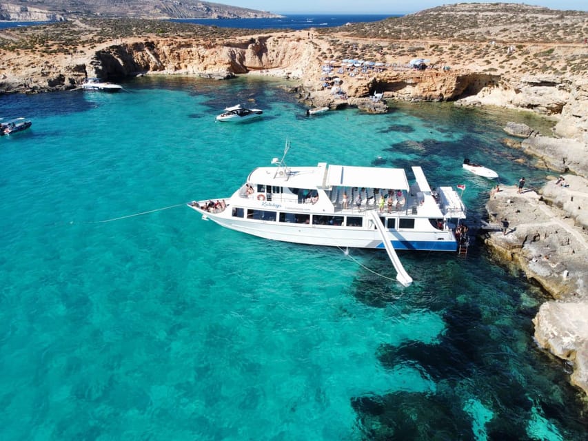 From Sliema: Gozo, Comino and Blue Lagoon Cruise - On-board comfort, the waterslide, and rough-water reality