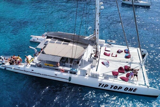 Full-Day Catamaran Cruise with Lunch in Island of Malta - Tip Top One Catamaran: roomy, relaxed, and not built for shoulder-to-shoulder cruising