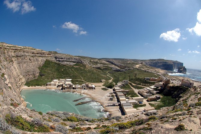 Gozo island guided day tour from Malta - Xlendi Beach, cliffs, and caves—your coastal “wow” stop