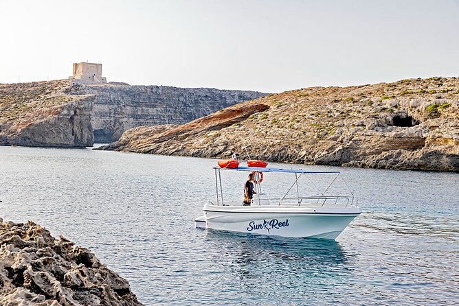 Half Day Blue Lagoon, Comino and Gozo Private Guided Boat Cruise - Halfa Rock in Qala: a Gozo swim stop with a pirate story