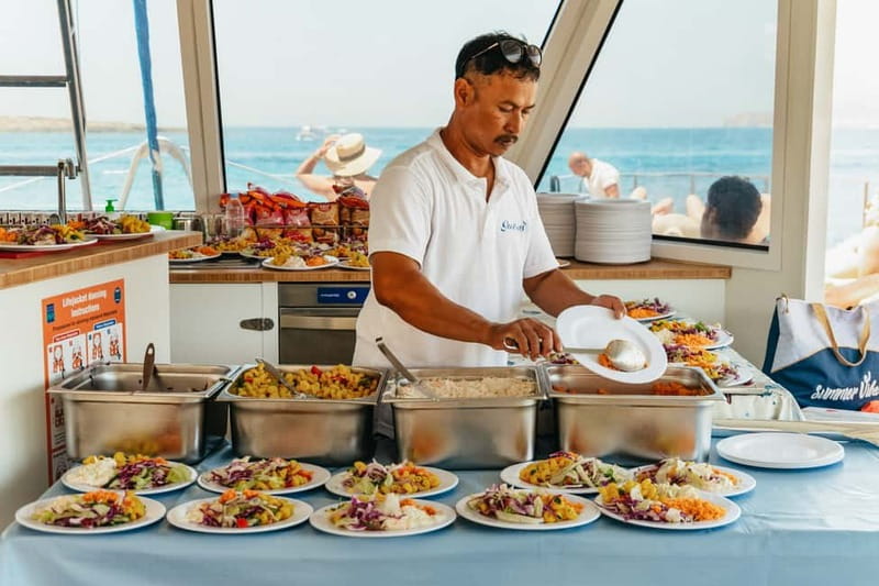 Malta: Blue Lagoon, Beaches & Bays Trip by Catamaran - Onboard Music, Cocktail Bar, and Sun Loungers: The Real Comfort Payoff