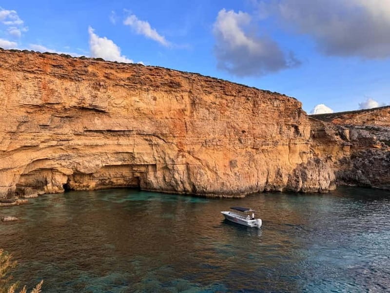 Malta: Blue Lagoon, Caves, Comino & Gozo Private Boat Trip - Crystal Lagoon: Deeper Water and Sea-Cave Scenery