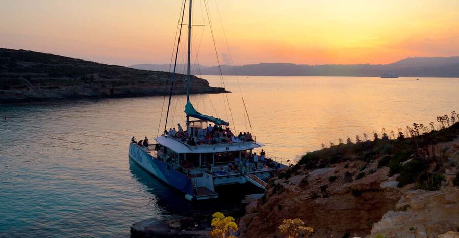 Malta: Blue Lagoon Evening Catamaran Cruise - Evening Catamaran Moments From Bugibba to the Blue Lagoon