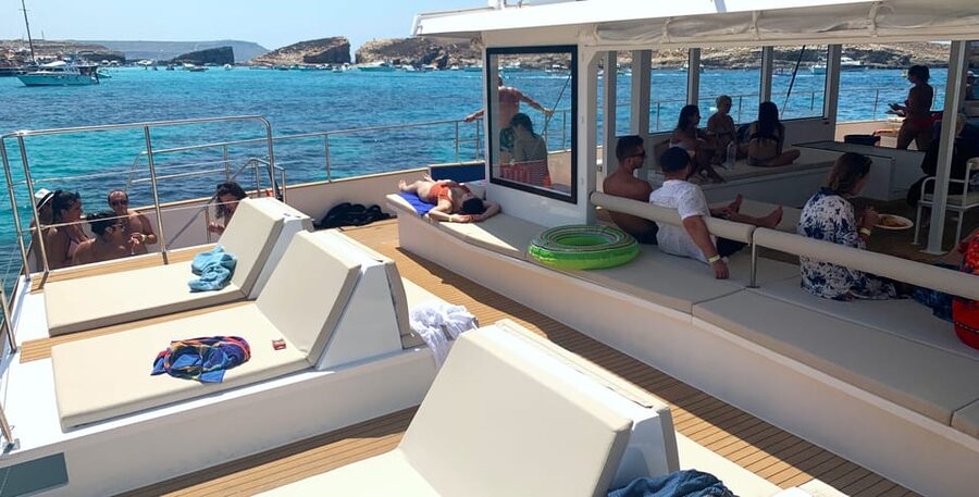 Malta: Blue Lagoon Evening Catamaran Cruise - Swimming at the Blue Lagoon Without the Crowds