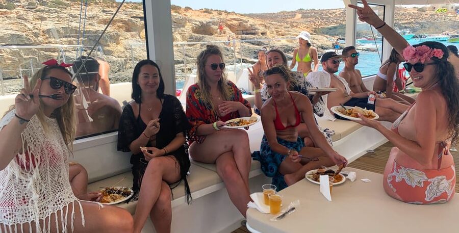 Malta: Blue Lagoon Evening Catamaran Cruise - Onboard Life: Music, Bar Drinks, and Sunset Deck Time