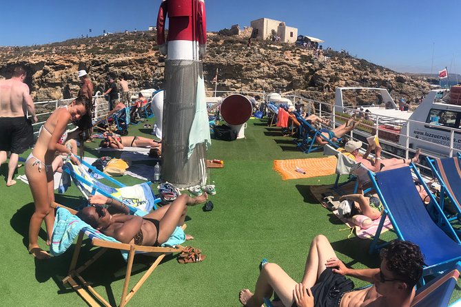 Malta: Comino, Blue Lagoon & Caves - swim, snorkel & slide - Cruising Comino: cliff views, Elephant’s Head, and the Santa Maria Tower