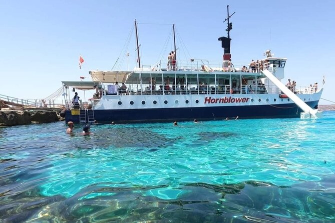 Malta: Comino, Gozo, Blue Lagoon, Crystal Lagoon and Caves Tour - What the boat experience feels like in real life