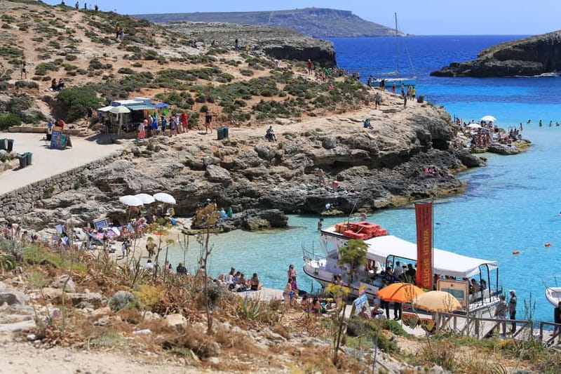 Malta: Comino+ Santa Maria Bay, Blue Lagoon + Seacaves tour - Blue Lagoon reality check: QR code rules and a rocky shoreline plan