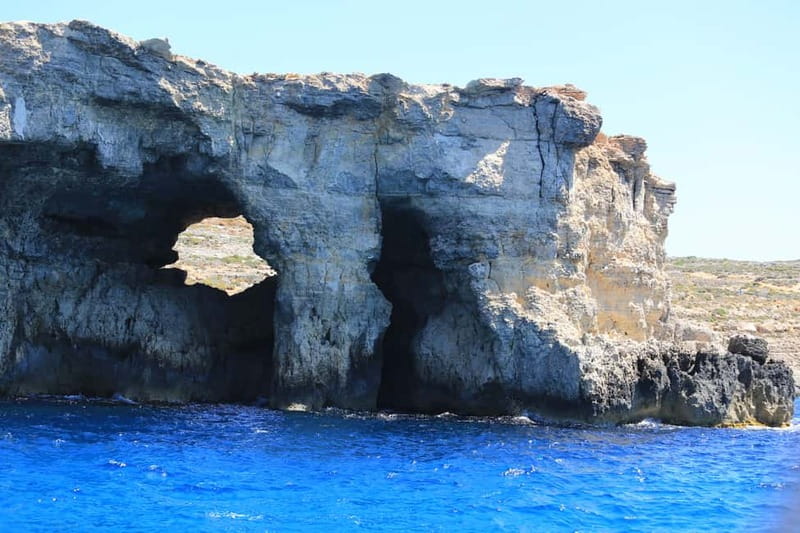 Malta: Comino+ Santa Maria Bay, Blue Lagoon + Seacaves tour - The return cruise: caves, rock formations, and more photo windows