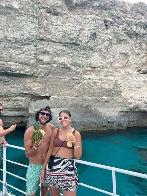 Malta: Gozo, Comino, Blue & Crystal Lagoon, & Caves Cruise - Comino onboard time: sun deck comfort, shade spots, and beach access