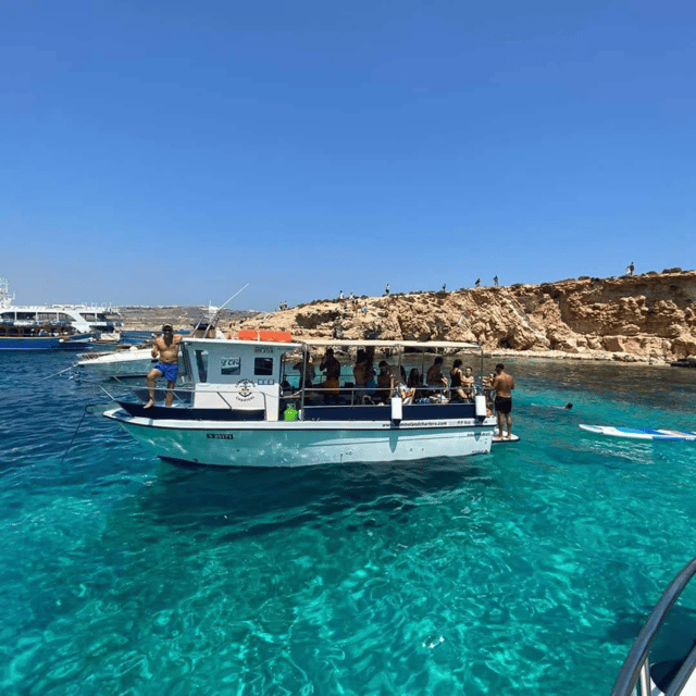 Malta: Gozo, Comino, Sea Caves, and Blue Lagoon Cruise - Passing Comino Tower and the Monte Cristo angle