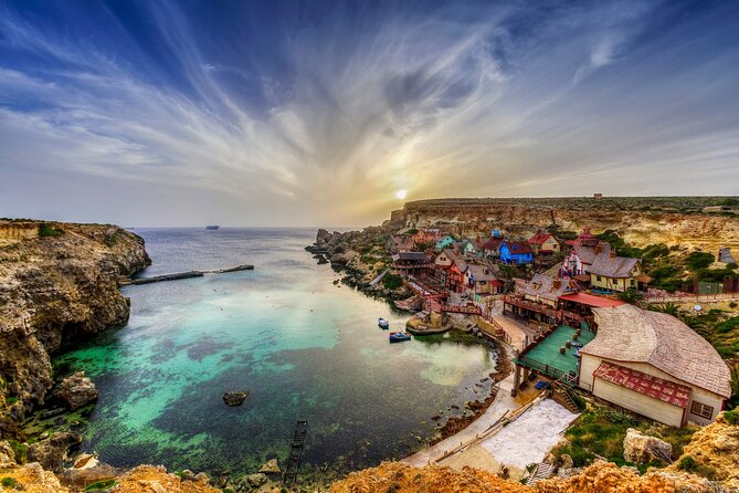 Malta: Half-Day Quad Bike Adventure Tour Including Transfers - Popeye Village and the Red Tower: Landmark Stops That Break Up the Ride