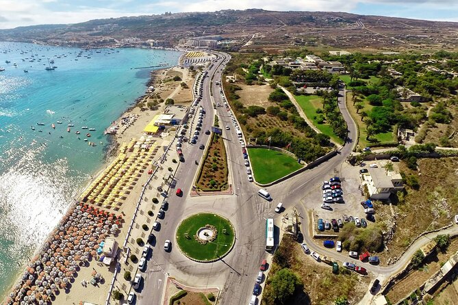 Malta: Half-Day Quad Bike Adventure Tour Including Transfers - The Immaculate Conception Chapel and Mellieħa Village Square Stops