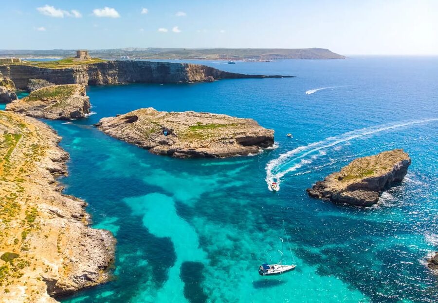 Malta: Roundtrip Ferry to Comino Blue Lagoon w/Gozo Option - Chasing the Comino Sea Caves From the Water