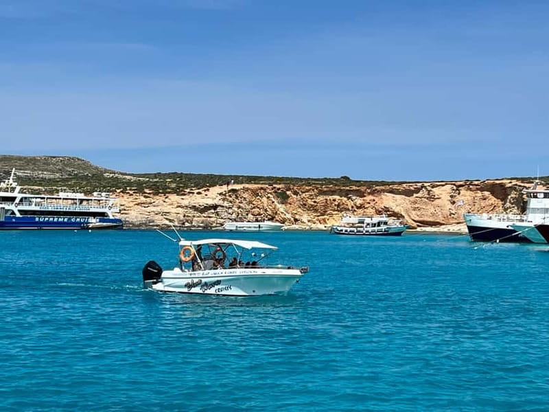 Mellieha: 1:00pm Speedboat round Comino Caves 2h Blue Lagoon - The Comino cave circuit: St Mary Battery Arch, Elephant Rock, and more