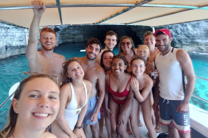 Mellieha: Gozo, Comino, Sea Caves, and Blue Lagoon Cruise - Blue Lagoon on Comino: the free pass rule and how to beat the hassle
