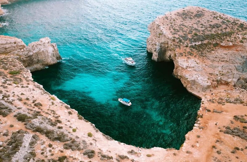 Mellieha: Round Comino, Blue Lagoon & Gozo Cruise with Water - The Scenic Coast Stops: Elephant Rock and Santa Maria Caves