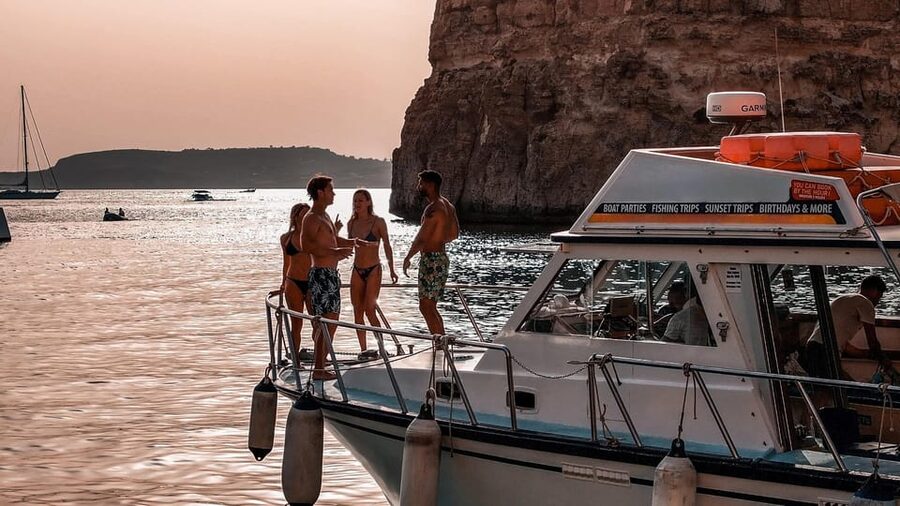Mellieha: Round Comino, Blue Lagoon & Gozo Cruise with Water - Onboard Fun: Water Slide, Showers, and Snorkel Gear