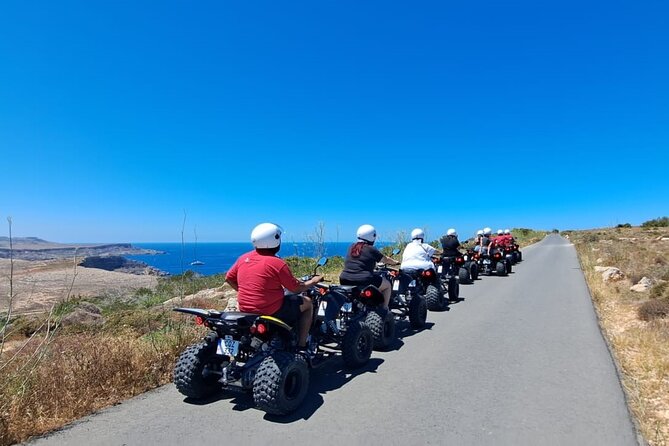 North Malta Quad Bike Tour with Land or Sea Views and Swimming - Safety, helmets, and riding comfort (front vs back seat)