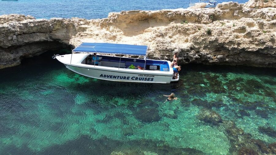 Sliema: Boat Trip to Comino Blue Lagoon, Gozo, and Caves - Halfa Rock in Gozo: the second swim that keeps it from feeling repetitive