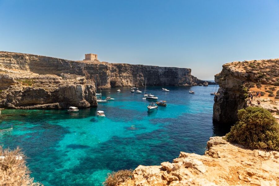 St Paul's Bay: Comino, Blue Lagoon, Gozo, & Caves Boat Tour - Blue Lagoon (Comino): the swim-and-snorkel stop and how to handle the crowds