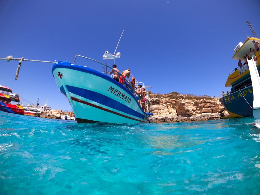 St Paul's Bay: Comino, Blue Lagoon, Gozo, & Caves Boat Tour - St Paul’s Island finale: statue ruins, one last swim, and great photo timing