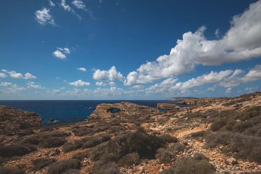 St Pauls: Gozo & Comino Islands, Blue Lagoon & Seacaves Tour - Cruise through the Comino Channel: sea caves on the move
