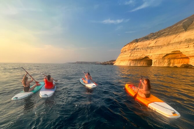 SUP Sunset Paddling to Ta Marija Caves - Getting on the board: Gnejna Bay slipway setup at 4:30 pm
