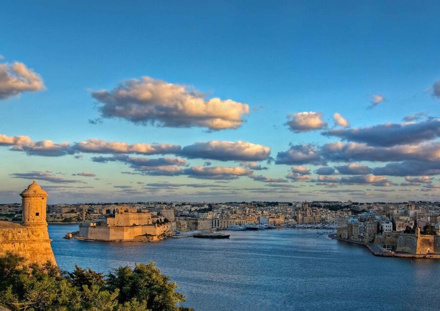 Valletta: Self-Guided Historical Walking Tour (Audio Guide) - Upper Barrakka views: gardens, palaces, and the Malta Stock Exchange area